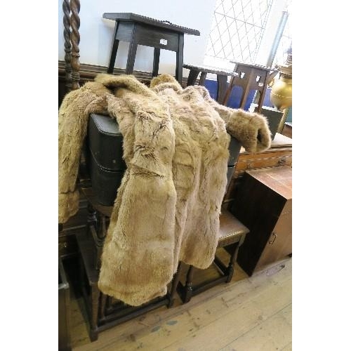 383 - AN ANTLER CASE, CONTAINING A FUR COAT