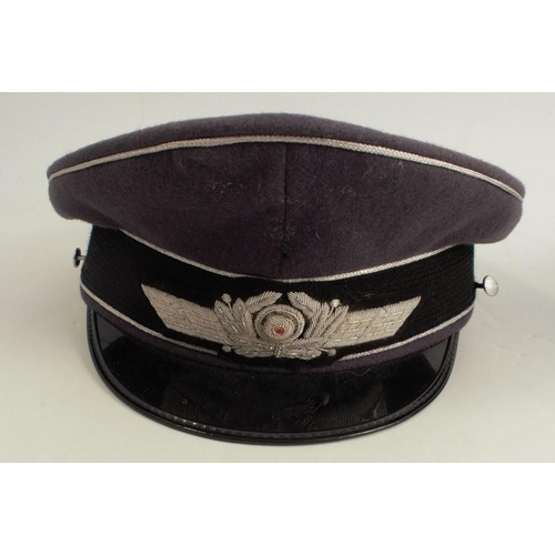 394 - Three reproduction German Waffen caps, together with another cap