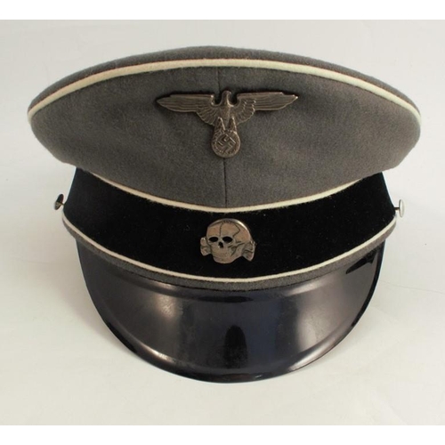 394 - Three reproduction German Waffen caps, together with another cap