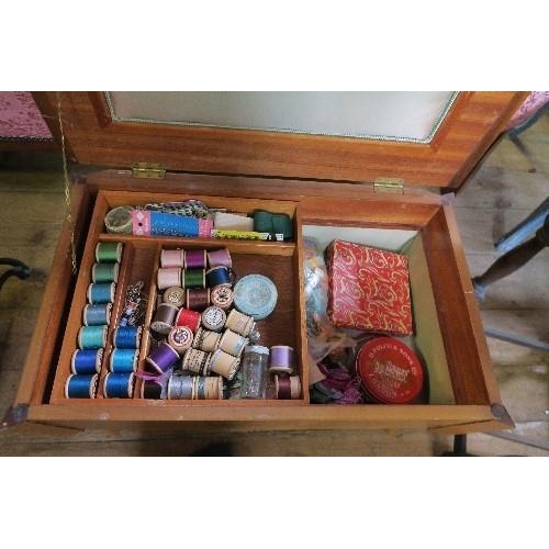 52 - A WALNUT SEWING TABLE, TOGETHER WITH A CONVERTED HMV GRAMOPHONE WITH SEWING ACCESSORIES