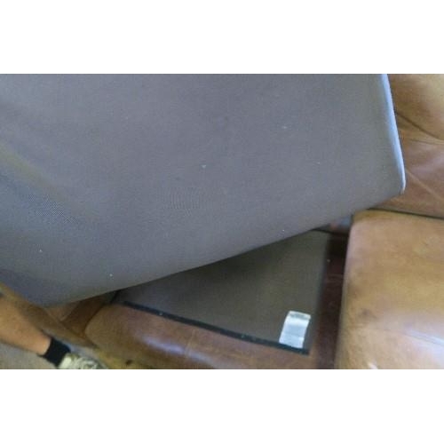 60 - A LEATHER TWO SEATER SOFA with fire labels