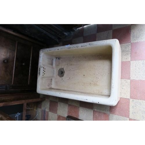 85 - A rectangular garden trough, 42ins x 16.5ins x 7.25ins, together with a kitchen sink