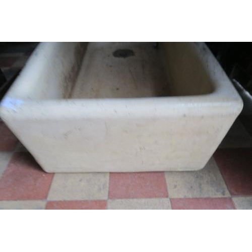 85 - A rectangular garden trough, 42ins x 16.5ins x 7.25ins, together with a kitchen sink