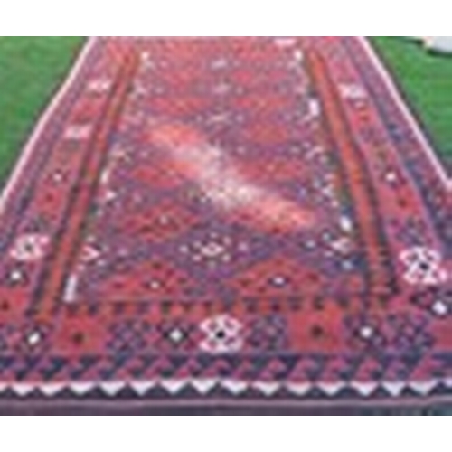 120 - A Kilim rug, decorated with repeating stepped diamonds to the field, 74ins x 120ins