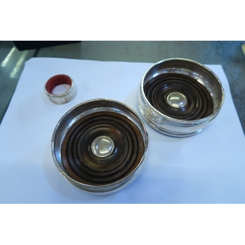 272A - A SILVER WINE COASTER, TOGETHER WITH ANOTHER, A NAPKIN RING AND A PAIR OF SALTS