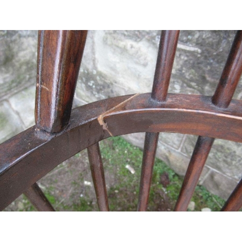 15 - An antique style Windsor chair, splat damaged and restored, split to back stretcher, together with a... 