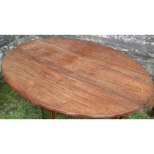 17 - A Georgian mahogany drop leaf wake table, fitted with an end drawer to one end, raised on eight reed... 