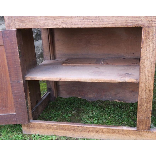 22 - An antique oak Welsh sideboard, with three drawers to the frieze, above cupboard doors to each side,... 