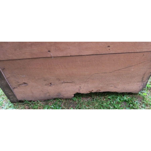 22 - An antique oak Welsh sideboard, with three drawers to the frieze, above cupboard doors to each side,... 