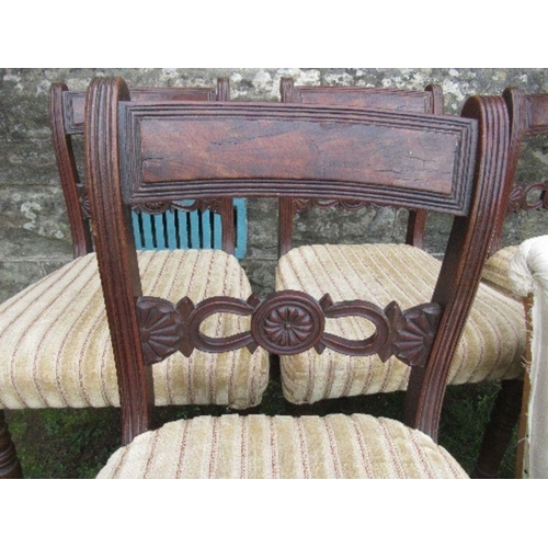 24 - A set of four 19th century mahogany bar back dining chairs, together with an easy chair