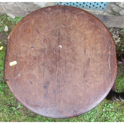 29 - An Antique cricket style table, with circular top and raised on three legs, diameter 16ins, height 2... 