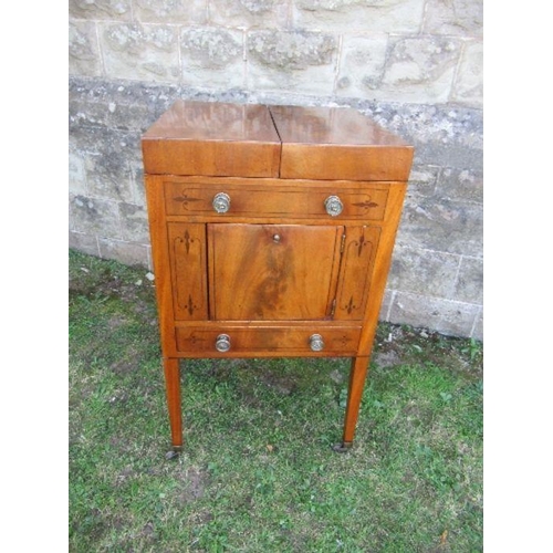 32 - A 19th century mahogany folding pot cupboard / dressing table, the top opening to reveal apertures a... 