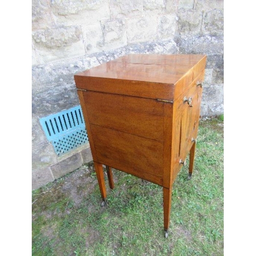 32 - A 19th century mahogany folding pot cupboard / dressing table, the top opening to reveal apertures a... 