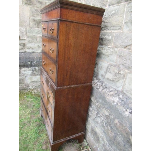 4 - A mahogany and walnut tallboy, fitted with two short drawers over two long drawers to the top sectio... 