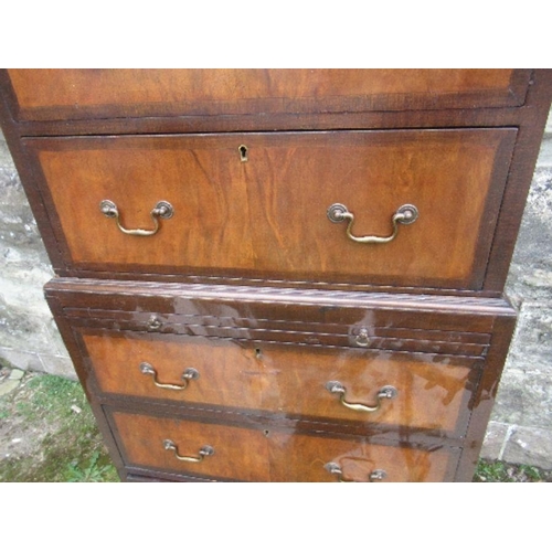 4 - A mahogany and walnut tallboy, fitted with two short drawers over two long drawers to the top sectio... 