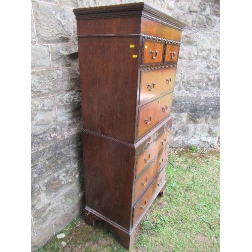 4 - A mahogany and walnut tallboy, fitted with two short drawers over two long drawers to the top sectio... 