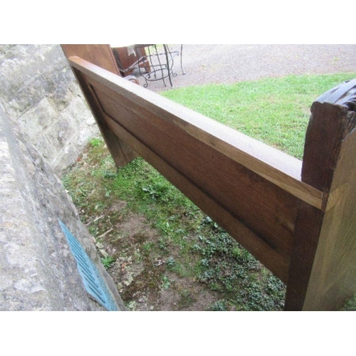 45 - An oak church pew, width 63ins x height 39ins