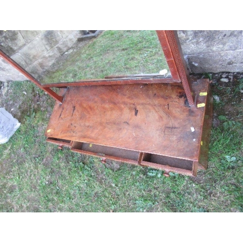 55 - A large 19th century mahogany swing frame toilet mirror, the base fitted with two long central drawe... 