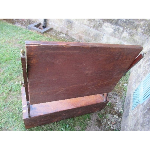 55 - A large 19th century mahogany swing frame toilet mirror, the base fitted with two long central drawe... 