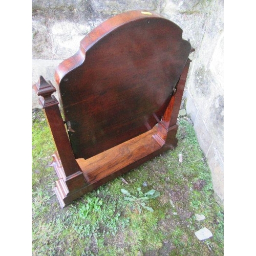 56 - A Victorian figured walnut toilet mirror, having kingwood banding and obelisk shaped supports, and s... 