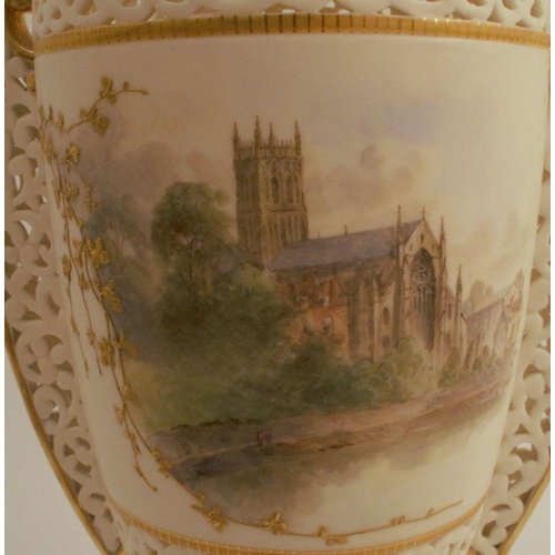 734 - A Grainger & Co Royal China Works Worcester reticulated ivory vase and cover, decorated with a view ... 