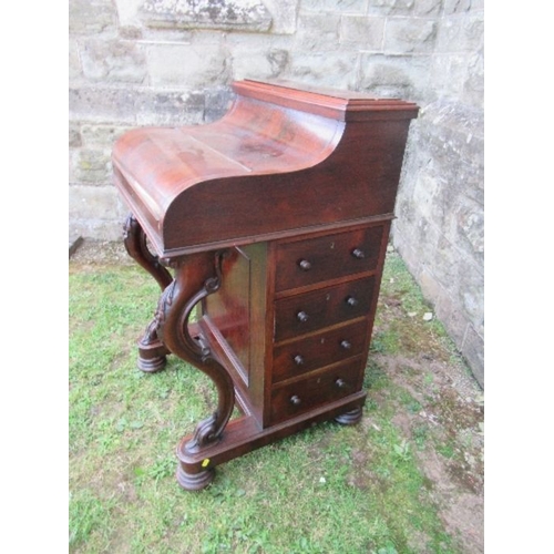 2 - A 19th century rosewood piano top Davenport, having secret writing compartment and rising lid, openi... 