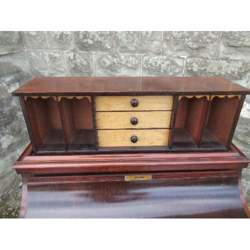 2 - A 19th century rosewood piano top Davenport, having secret writing compartment and rising lid, openi... 