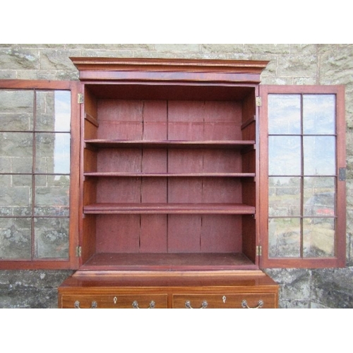 14 - A 19th century design mahogany glazed cabinet, the upper section having glazed doors opening to reve... 