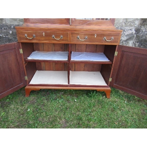 14 - A 19th century design mahogany glazed cabinet, the upper section having glazed doors opening to reve... 