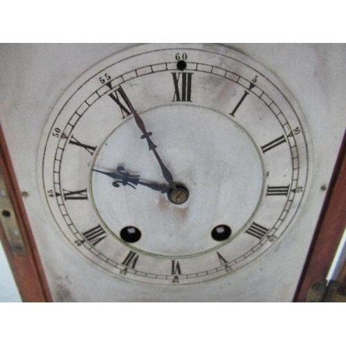 138 - A modern cased striking mantle clock, with square silvered dial, height 11ins