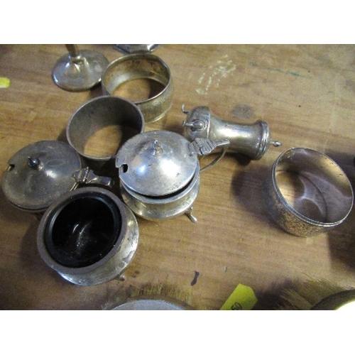 147 - A collection of hallmarked silver, to include dressing table brushes, pots, condiment pots, napkin r... 