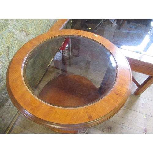 19 - An American reproduction glass top coffee table, width 41ins x height 17.5ins, together with a circu... 