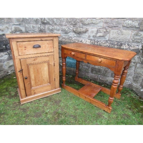 25 - A pine cabinet, having cupboard door below a drawer, width 27ins x depth 14ins x height 39ins, toget... 