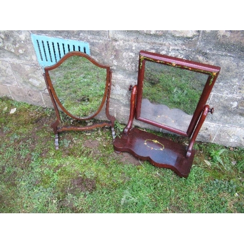 31 - Two swing frame toilet mirrors, one with painted floral decoration