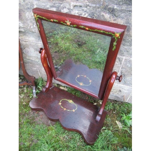 31 - Two swing frame toilet mirrors, one with painted floral decoration