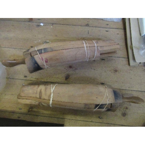 373 - A pair of wooden boot trees, in three sections, marked L and R, missing the foot sections