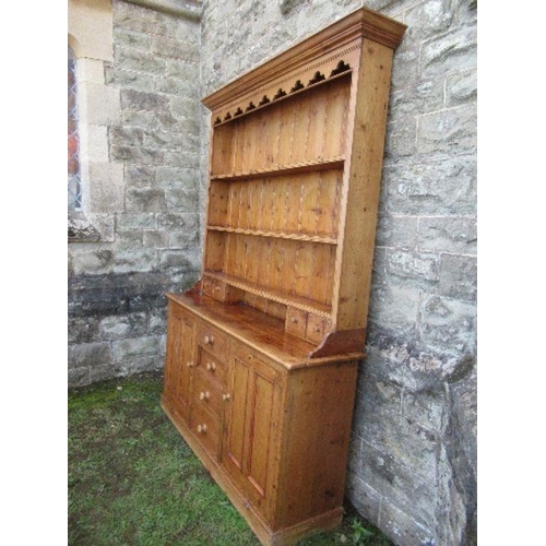 41 - A pine dresser, with plate rack over, width 70ins x depth 16ins x height 84ins