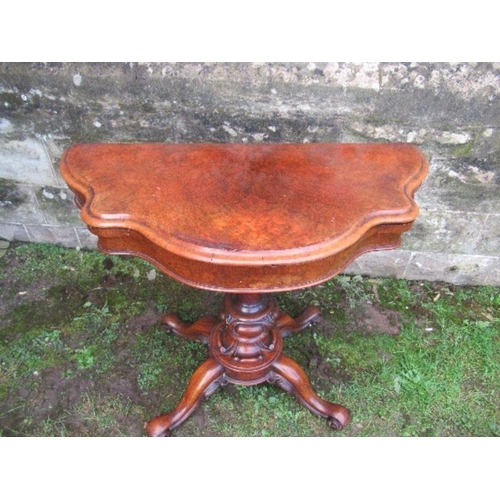 42 - A burr walnut card table, width 36ins