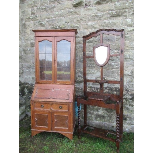 43 - An oak bureau bookcase, width 30ins x height 80ins, together with a hall stand, and a serpentine sha... 