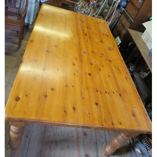 5 - A large pine kitchen table, 84ins x 47ins, height 30ins