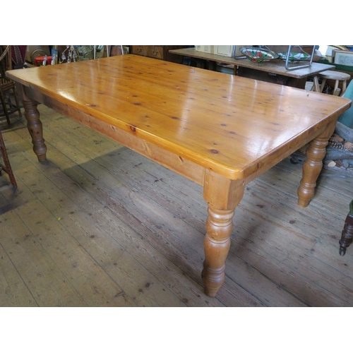 5 - A large pine kitchen table, 84ins x 47ins, height 30ins