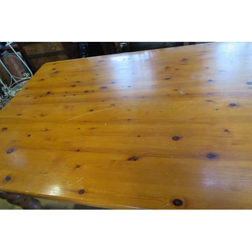 5 - A large pine kitchen table, 84ins x 47ins, height 30ins