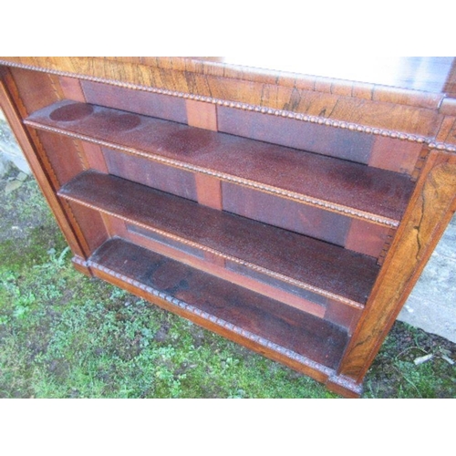 51 - A Victorian rosewood set of shelves, with mirror above, adjustable shelves, width 43ins x depth 8ins... 