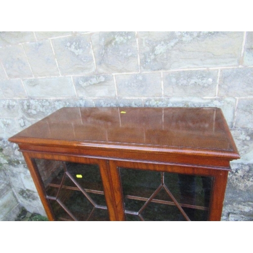 52 - A Georgian design glazed cabinet, the astragal glazed doors opening to reveal shelves, width 34ins x... 