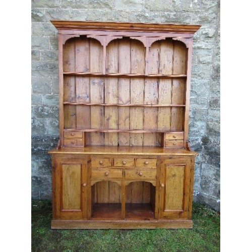 6 - A pine dresser, with arcaded upper section, width 70ins x depth 16ins x height 84ins