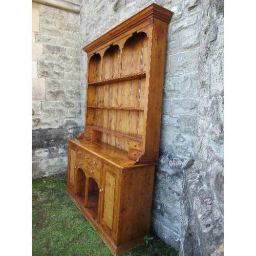 6 - A pine dresser, with arcaded upper section, width 70ins x depth 16ins x height 84ins