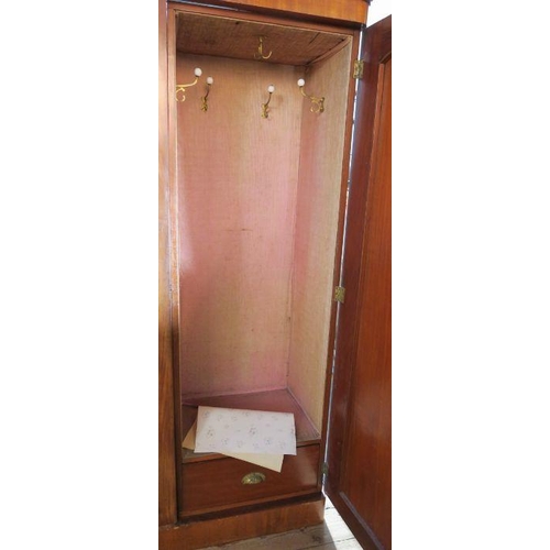 60 - A Victorian mahogany double door wardrobe, fitted with a hanging space and drawer to one side, with ... 