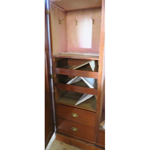 60 - A Victorian mahogany double door wardrobe, fitted with a hanging space and drawer to one side, with ... 