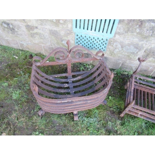 64 - Two wrought iron fire grates, widths 22ins and 21ins