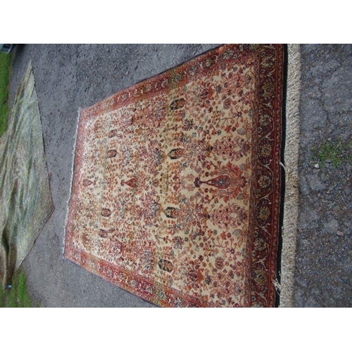 75 - An Eastern design rug, decorated with foliage, 66ins x 93ins